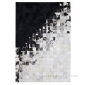 Cowhide black and white leather center area rug